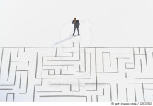 128103552 | 게티이미지코리아 | Miniature businessman ponder the maze Royalty-Free 이미지