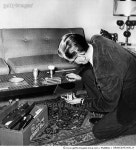 게티이미지코리아 | WIRETAPPING. /nA man installing an electronic listening device in a home. Rights-Managed 이미지