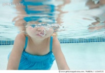 163445535 | 게티이미지코리아 | USA, Utah, Orem, Girl (2-3) swimming in pool Royalty-Free 이미지