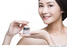 508473969 | 게티이미지코리아 | Beautiful young woman with cosmetic product Royalty-Free 이미지