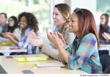 531990949 | 게티이미지코리아 | College students applauding guest speaker in lecture hall Royalty-Free 이미지