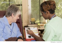 516933292 | 게티이미지코리아 | Home healthcare nurse with senior adult patient. Consulation. Medical results. Royalty-Free 이미지