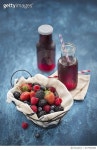 637903880 | 게티이미지코리아 | Mix berry fruits and juice on rustic blue background. Royalty-Free 이미지