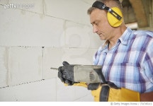 731745111 | 게티이미지코리아 | Carpenter works at his workshop. Debica, Poland Royalty-Free 이미지