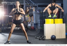 ITTEM17013483 | 게티이미지코리아 | Young athletes practicing crossfit at gym Royalty-Free 이미지