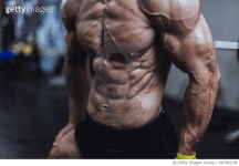 867360158 | 게티이미지코리아 | Young man showing his muscles in the gym Royalty-Free 이미지