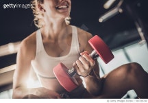 910339740 | 게티이미지코리아 | Clsoe up of happy woman having strength exercises with hand weight in a gym. Royalty-Free 이미지