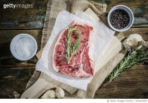919443064 | 게티이미지코리아 | Raw beefsteak with rosemary, salt and pepper Royalty-Free 이미지