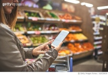 926538838 | 게티이미지코리아 | Keeping tabs on everything she buys with mobile tech Royalty-Free 이미지