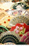 988100732 | 게티이미지코리아 | Handicraft fans on a souvenir shop, Sierpes street, Seville, Spain Royalty-Free 이미지
