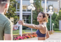 1038822682 | 게티이미지코리아 | Photo of happy fitness woman drinking water after workout. Royalty-Free 이미지