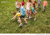 1130264623 | 게티이미지코리아 | Group of playful children having fun while playing soccer in nature. Royalty-Free 이미지