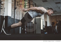 1138008094 | 게티이미지코리아 | A young athlete going to extremes in a gym Royalty-Free 이미지