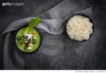 1134461204 | 게티이미지코리아 | Green thai curry with spinach, pak choi, tofu, sour cream, black sesame and jasmine rice Royalty... 