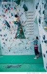 1140505430 | 게티이미지코리아 | Two girls practicing at a rock climbing gym Royalty-Free 이미지