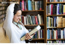 1149465729 | 게티이미지코리아 | Cheerful Librarian. Are books part of your life? Be a Librarian. Royalty-Free 이미지