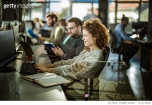 1151539058 | 게티이미지코리아 | Happy female programmer working on PC in a computer software company. Royalty-Free 이미지