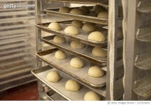1157516919 | 게티이미지코리아 | Handmade dough balls wait to be baked in the oven Royalty-Free 이미지