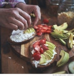 1206057033 | 게티이미지코리아 | Preparing Avocado Sandwich with Brown Bread, Cottage Cheese and Eggs Royalty-Free 이미지