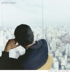 a0130-000092 | 게티이미지코리아 | Businessman Viewing Cityscape Royalty-Free 이미지