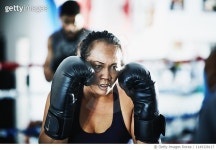 1149328117 | 게티이미지코리아 | Female boxer training in boxing ring in gym Royalty-Free 이미지
