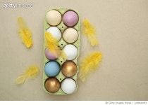 1209643453 | 게티이미지코리아 | Easter eggs colorful on beige background Royalty-Free 이미지