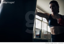 1249008398 | 게티이미지코리아 | Female boxer training in gym Royalty-Free 이미지