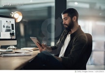 1291328191 | 게티이미지코리아 | A few taps away from finishing his task Royalty-Free 이미지