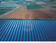 1302005899 | 게티이미지코리아 | Aerial View of Solar Panels on Greenhouse Rooftops. Sustainable Agriculture Business. Royalty... 