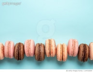 1347336387 | 게티이미지코리아 | Close-up of macaroons against blue background Royalty-Free 이미지