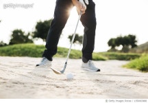 1350063888 | 게티이미지코리아 | Golfer hitting driver in a bunker Royalty-Free 이미지