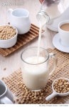1457163898 | 게티이미지코리아 | High angle view of milk pouring milk in drinking glass on table,Bekasi City,West Java,Indonesia... 