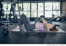 1488825594 | 게티이미지코리아 | Young woman training in gym with dumbbells Royalty-Free 이미지