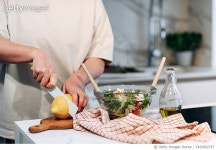 1493002747 | 게티이미지코리아 | woman cooking vegetable salad tomatoes, green salad, olive oil Royalty-Free 이미지