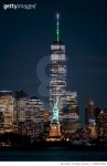 1500901864 | 게티이미지코리아 | View of the Statue of Liberty at night against One World Trade Center in Lower Manhattan.... 