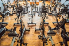 Aerobics Spinning Exercise Bikes Gym Room with Many in a Row Stock Image - Image of hotel, indoors: 159311181