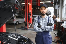 Male Mechanic in Car Service Center Stock Photo - Image of station, portrait: 273572076