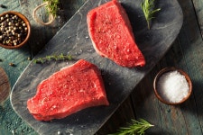 Heart Shaped Raw Beef Meat with Spices on Grill Tray. Healthy Lifestyle or Organic Food Concept for Meat Lovers Stock Image... 
