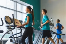 Woman Exercising at the Gym on a Cross Trainer Stock Photo - Image of bodycare, latin: 67619224