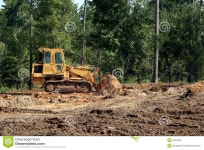Bulldozer pushing sand stock image. Image of excavate - 3240205