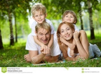 Family on a lawn stock photo. Image of mother, embracing - 11091768