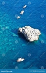 Faraglioni di Capri stock photo. Image of boat, beach - 21794380