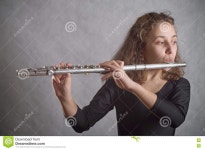 Girl Playing Flute stock photo. Image of wind, play, woman - 71598750
