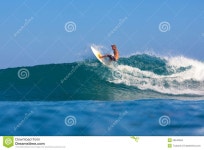 Surfing a wave stock photo. Image of blue, clear, spray - 29643694