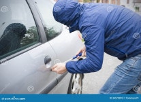 Thief stealing car stock photo. Image of apartment, balaclava - 34570992