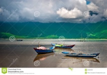 Tranquil Bay with Wooden Boats in Vietnam Stock Photo - Image of reflected, calm: 24002220 Tranquil Bay With Wooden Boats In... 