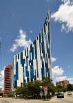 The modernist and highly unusual Ascent Building, a curved apartment building that comes to a sharp point overlooking the John A.... 