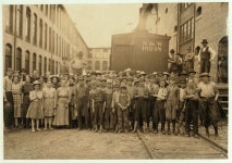 A part of the spinning force working in the Washington Cotton Mills, Fries, Va. Group posed by the overseer. All work. The... 