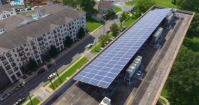 Solar rooftop on apartment condo building in Nashville, Tennessee. Production of clean ecological electrical energy. Renewable... 