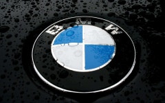 Download Prominent BMW Logo on a Grey Background Wallpaper | Wallpapers.com